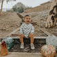 “MAMA’S BOY” CHECKERED ROMPER
