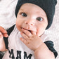 “MAMA’S BOY” TWO TONE SHORT SLEEVE ONESIE