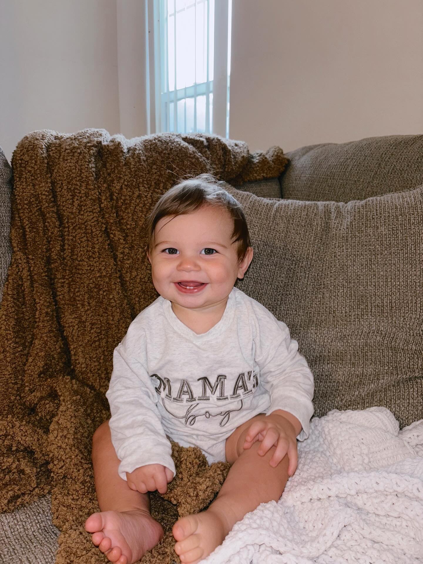 “MAMA’S BOY” EMBROIDERED ONESIE