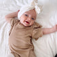 RUFFLE SLEEVED ONESIE