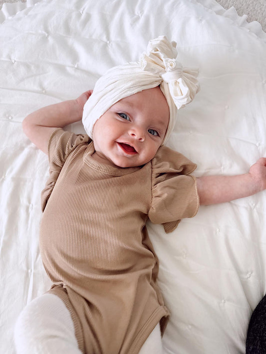 RUFFLE SLEEVED ONESIE