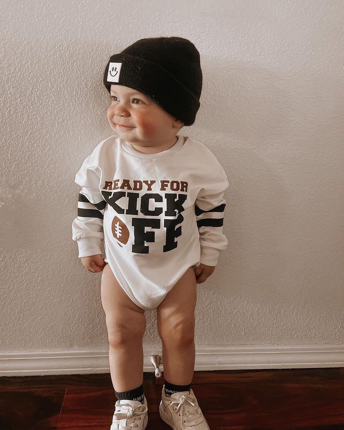 "KICK OFF" ONESIE