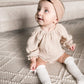 RUFFLE CUFF ONESIE