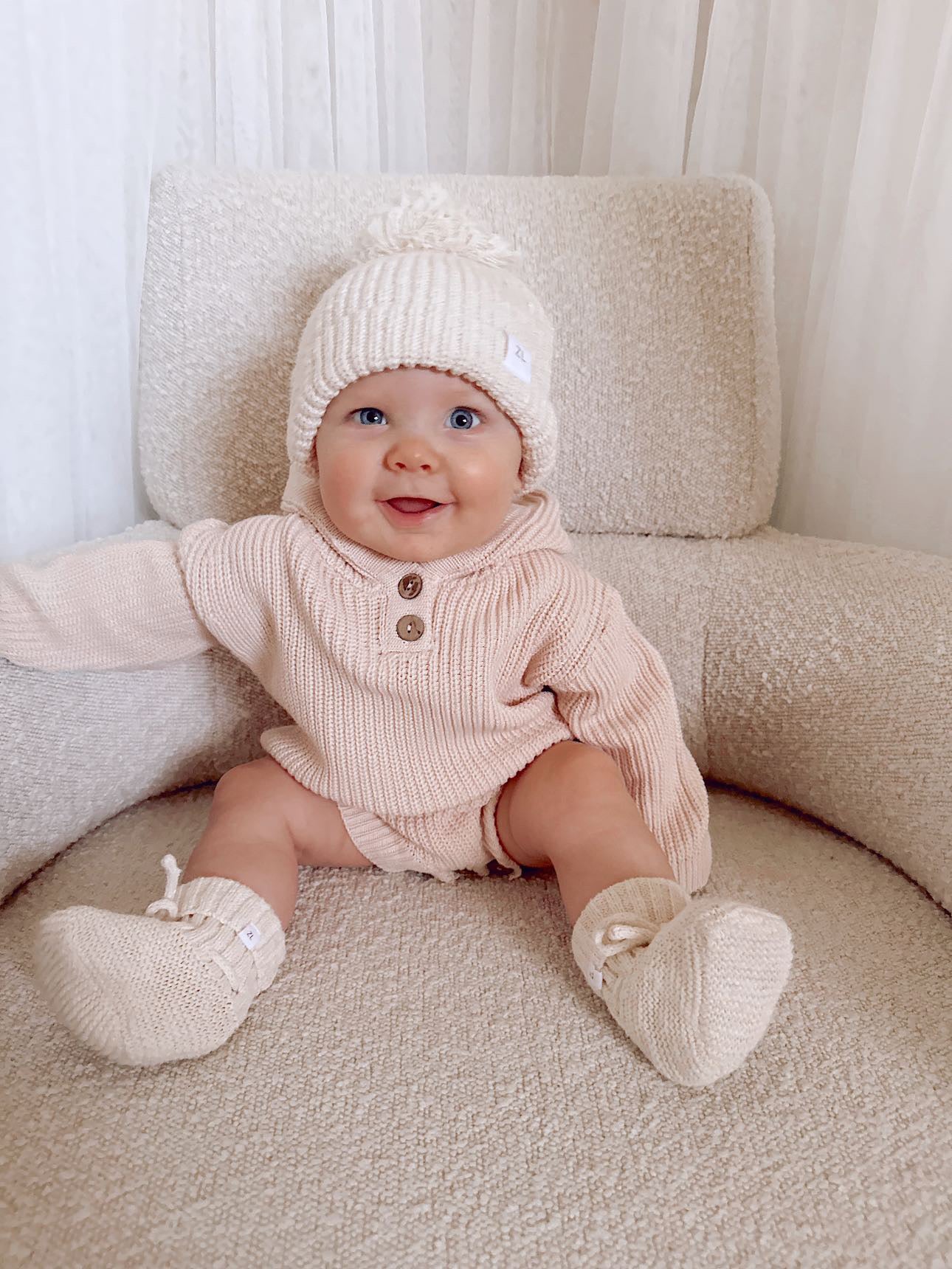 KNITTED HOODED ROMPER