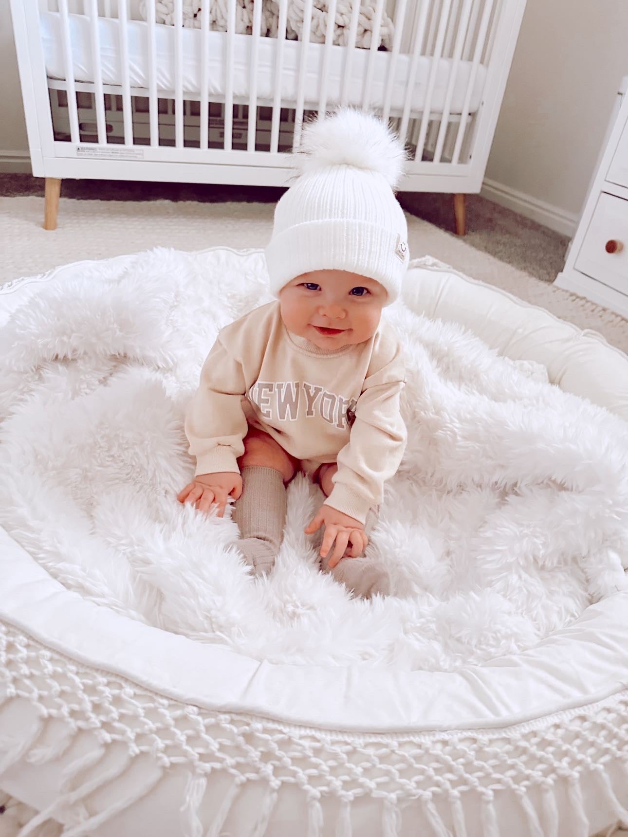 SMILEY FACE POMPOM BEANIE