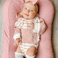 HOODED PINK STRIPED ONESIE