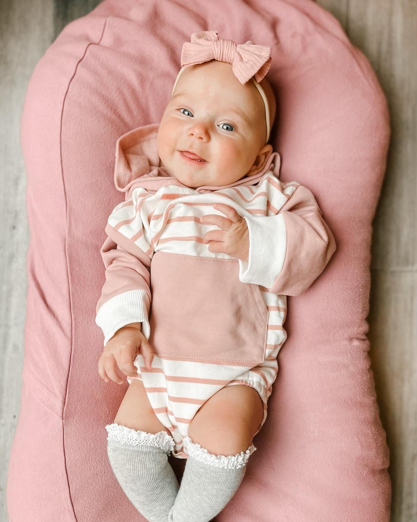 HOODED PINK STRIPED ONESIE