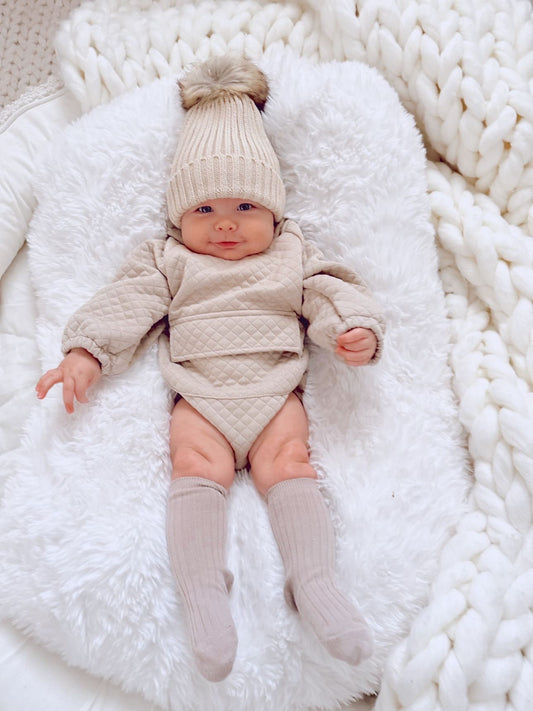 QUILTED HOODED ROMPER