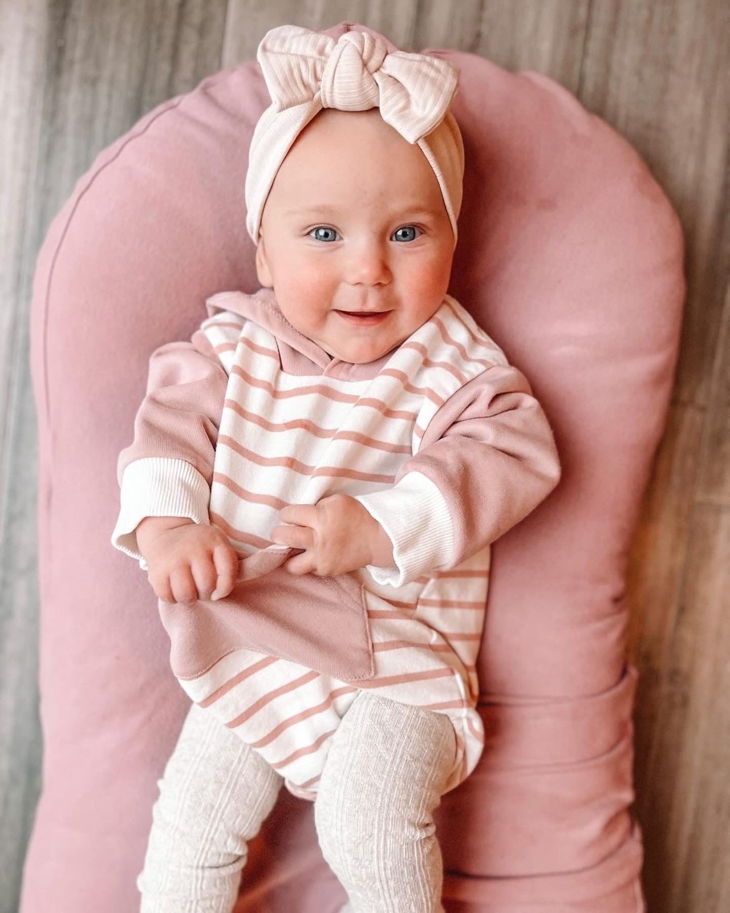 HOODED PINK STRIPED ONESIE